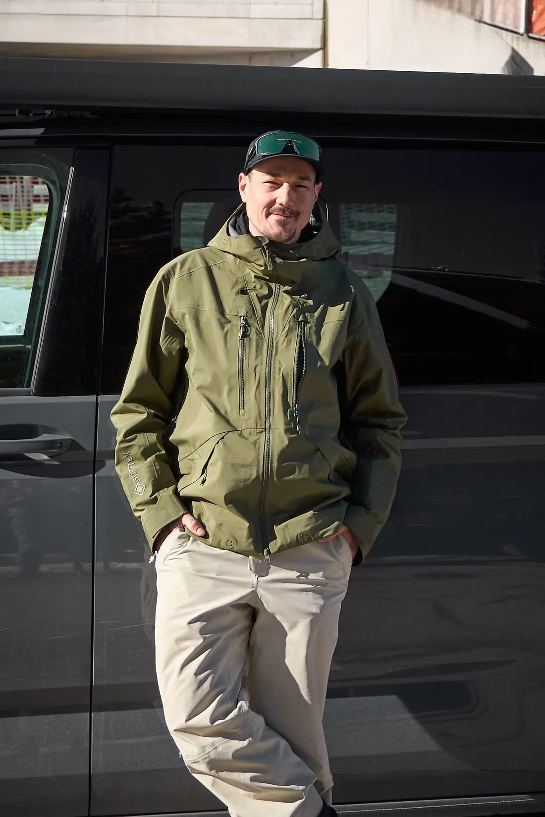Porträt des Lungauer Outdoor- und Sportfotografen Didi Körbler in grüner Jacke