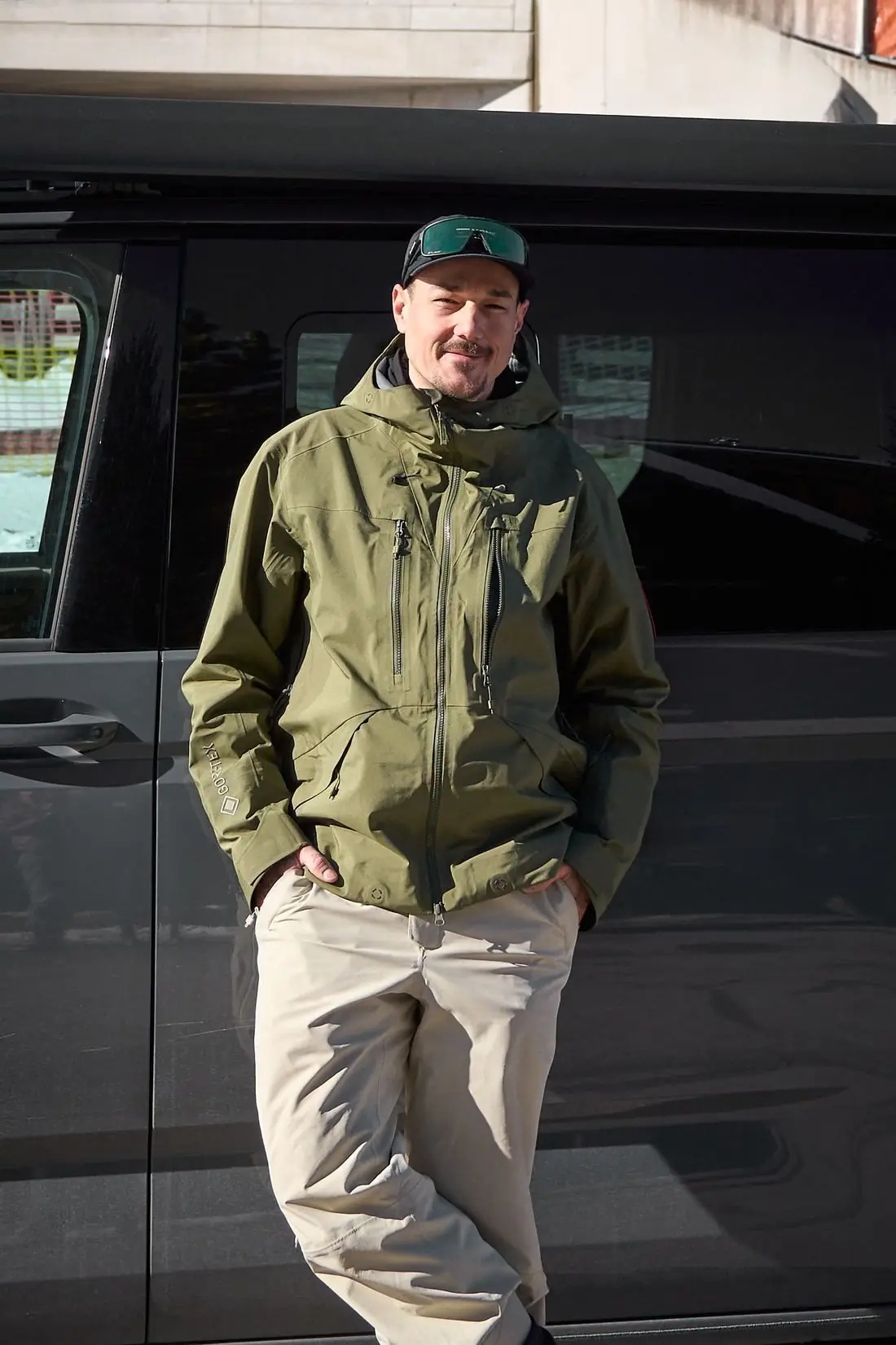 Porträt des Lungauer Outdoor- und Sportfotografen Didi Körbler in grüner Jacke